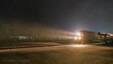 Westbound Freight Train In Snowy Predawn 90D94704