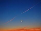 Crescent Moon Beyond Contrail At Dawn DSCN012130