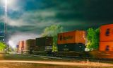 Eastbound Train Departing Into Night Fog 90D129496