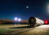Crescent Moon Beyond CPKC Rail Yard At Dawn 90D132344