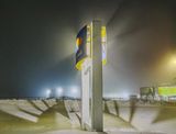 VIA Rail Station Sign On A Foggy Night 90D134631-5