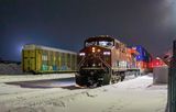 CPKC Westbound Freight Train At Night 90D143193