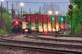 Departing CPKC Train Lit By Oncoming VIA Train 90D154711