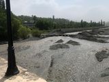 098 Crossing the River to Red Town- water is gray with snow melt.jpg