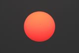 Sunspots Through the Haze
