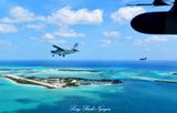 Flight of 3 Kodiak 100 over Normans Cay, Normans Cay Marina, Wax Cay, Boot Cay, Exuma, The Bahamas 202