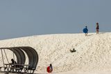 Sliding on the Sand