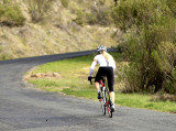 girl cycling up Sugarloaf