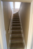 Stairs to third floor master suite