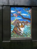 Tiger motif stained class panel, Valley of the Temples, Kaneohe, Oahu, Hawaii