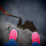 Took my walk today...stopped to play in a puddle.