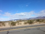 Some mountains in the distance to break up the nothing. 