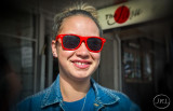 The girl with red sunnys.