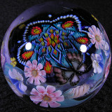 Tomomis equatorial flower design envelopes the RR disc perfectly, with a gorgeous butterfly.