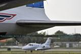 John Travolta's Eclipse 500 N218JT behind the Historical Flight Foundation's DC-7B N836D at Opa-locka Executive Airport