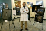 November 2012 - Suresh Atapattu with his exhibit of Space Shuttle photographs for sale with all proceeds going to the United Way