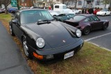 Porsche 911 RS America, with reflections of contrails on hood and bumper (4807)