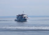 The boat to take us whale watching is coming into port at Baie Ste-Catherine.