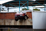 Car ploughs through rooftop carpark wall