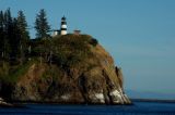 LIGHTHOUSE OVERLOOKING THE OCEAN