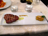 Veal steak with side of cooked apple with fennel seeds .. 6352