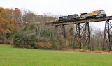 NS 055 heads East over the Pope Lick bridge on a cloudy morning. 