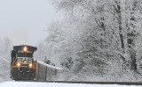 Eastbound T79 works up the hill at Clarks Station with a Dash 9 running long hood forward 