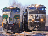 Northbound NS 142 passes Southern 8099 at the North end of Oneida yard