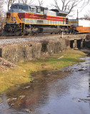 Lackawanna 1074 trails train 23G along Town Branch creek in Harrodsburg