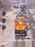A brand new BNSF ES44C4 leads NS 68K at South Danville