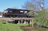 A newly rebuilt SD60E leads train 223 through Harrodsburg