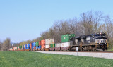 Train 295 sprints down the valley near McKinney with 10,000 feet of stacks in tow 