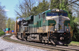 After meeting a pair of Westbounds, NS 23G slowly drags out of the hole at Tucker