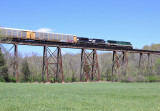 Eastbound 23G eases across a 25mph slow order and the Pope Lick bridge