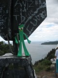 Gumby clings to the navigational marker at the top of the volcano