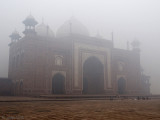 Mosque at Taj Mahal on a cold and foggy day