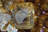 Fluorite twin, ca 3 mm across showing trapezohedral corners. California Mine, Little Eggleshope, Teesdale, Co Durham.