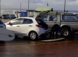 Getting ready to surf - Muizenberg Beach Parking Lot