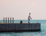 Photographer on the Dhoni dock