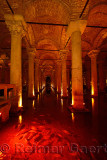 Fish in red light with marble columns of the underground Basilica Cistern of Istanbul Turkey
