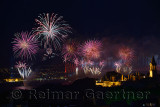 Red Republic Day fireworks on the Bosphorus with Bridge lights and Topkapi and Dolmabahce Palaces Istanbul