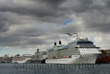 Cruise ships on the Bosphorus Strait at Istanbul with Suleymaniye Mosque and clouds