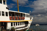 Sea bus ferry anchored at Eminonu terminal Istanbul on the Bosphorus Strait