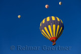 Overhead hot air balloons and flame from propane heater in Cappadocia Turkey