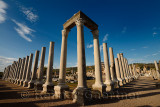 Colonade and corner pillars with lintel of Agora ruins at ancient Perge archaeological site Turkey
