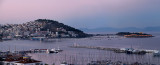 Panorama of Kusadasi Harbour Turkey and Pigeon Island with Guvercin Adasi before sunrise