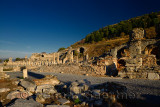 Basilica stoa royal porch at the state Agora with the Odeon at left and gymnasium at right in ancient Ephesus Turkey