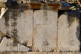 Latin inscription on stone blocks on Curetes street of ancient Ephesus Turkey