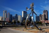 Walking Tall sculpture and Dallas Skyline