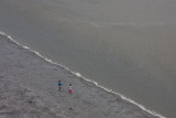 Small people on the beach